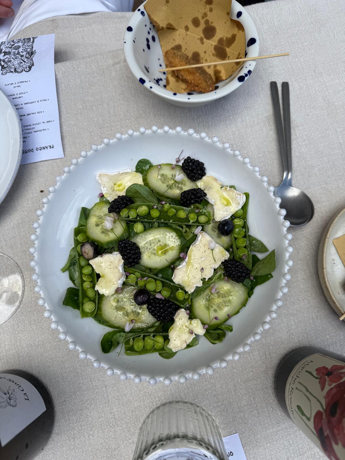 Spring salad with blackberries, peas and fresh cheese